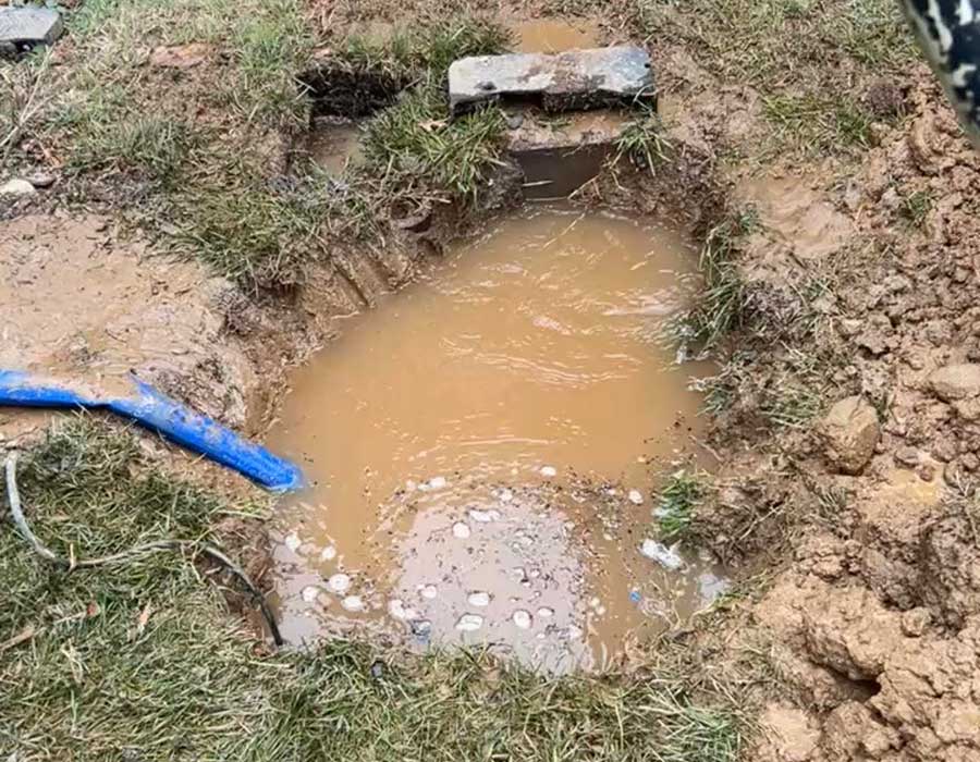 Yard excavation for main water line repair in Warrenton